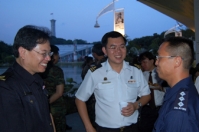 Chief of Medical Corps (centre) with SCDF guests