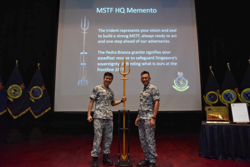 MSTF Master Chief ME5 Ong Teck Lim presented a fitting memento from MSTF HQ to RADM Seah.