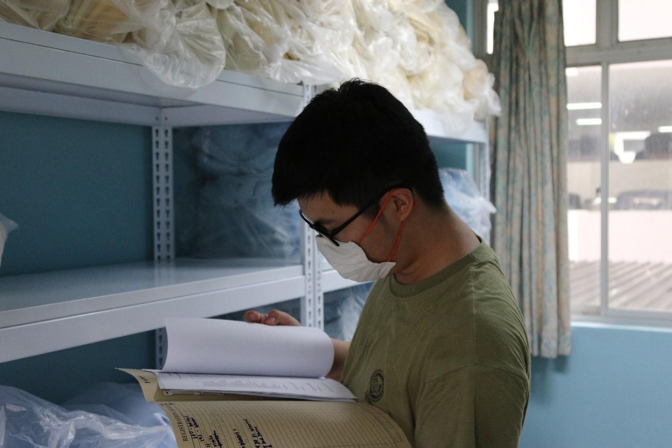 LCP Lim doing inventory checks.