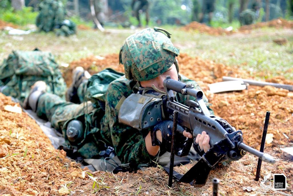 One of the soldiers in the prone position during field camp.