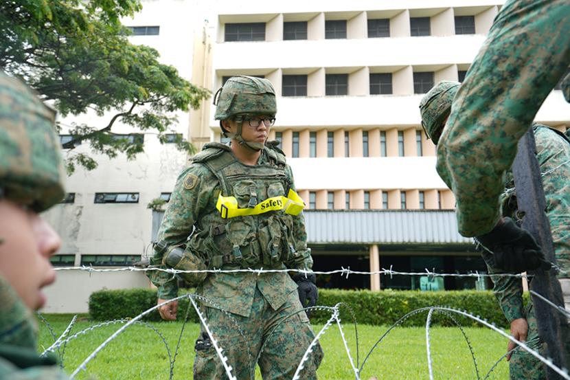 3SG Yeo Kai Jie, Section Commander, 38 SCE, ensuring that safety is being observed by his troopers.
