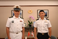 Chief of Staff - Naval Staff (COS-NS) of Republic of Singapore Navy Rear Admiral (RADM) Augustine Lim (right) with the People's Liberation Army's (Navy) [PLA Navy] Commander of Task Force 536 (Political Commissar) Senior Captain (SCAPT) Ruan Kai (left)