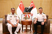 Chief of Republic of Singapore Navy Rear Admiral (RADM) Sean Wat (right) with Malaysian Maritime Enforcement Agency (MMEA) Deputy Director General (Logistics) Vice Admiral (VADM)(Maritime) Datuk Saiful Lizan bin Ibrahim (left)