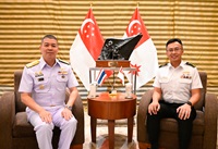 Chief of Republic of Singapore Navy Rear Admiral (RADM) Sean Wat (right) with Commander-in-Chief of Royal Thai Fleet, Royal Thai Navy, Admiral (ADM) Nuttapol Diewvanich (left)