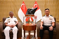 Chief of Republic of Singapore Navy Rear Admiral (RADM) Sean Wat (right) with Commodore Naval Component, Timor-Leste Armed Forces, CDRE Higino das Neves (left)