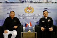 Chief of Republic of Singapore Navy Rear Admiral (RADM) Sean Wat (right) with Flag Officer-in-Command, Philippine Navy, Vice Admiral (VADM) Jose Ma. Ambrosio Ezpeleta (left)