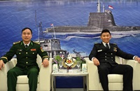 Chief of Staff - Naval Staff (COS-NS) of Republic of Singapore Navy Rear Admiral (RADM) Augustine Lim (right) with Deputy Chief of Staff of Vietnam Border Guard Senior Colonel (Snr COL) Vu Van Hung (left) 