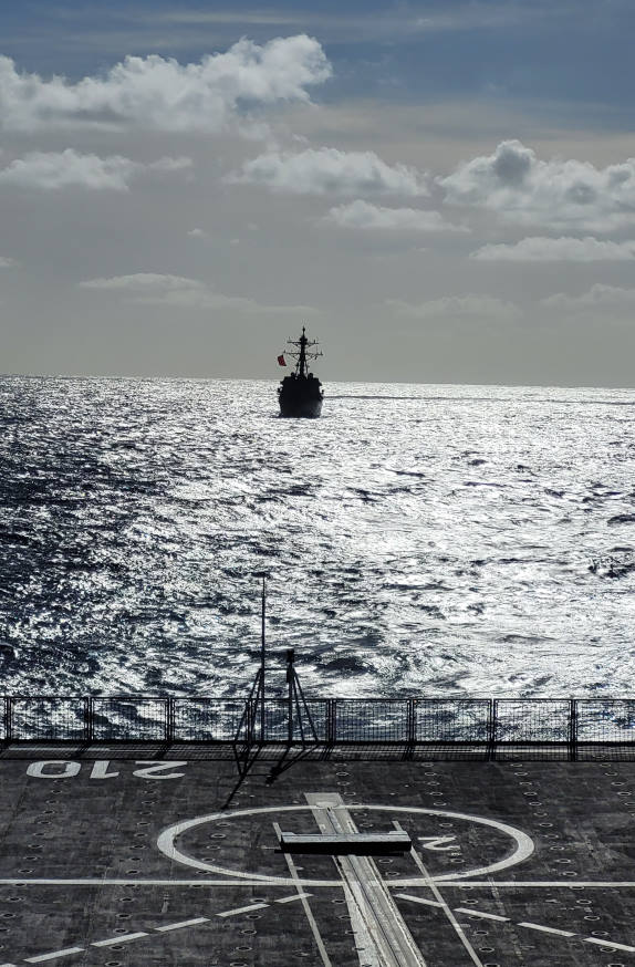 USS Chafee (foreground) and RSS Endeavour conducting naval manoeuvres during the exercise.