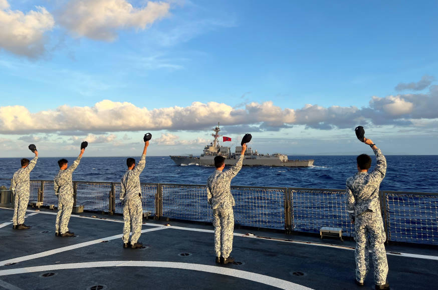 Crew from RSS Endeavour waving farewell as the PASSEX concluded with a sailpast!