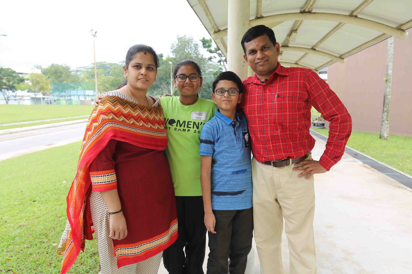 Ms Athi Ramesh Athirah (2nd from left) with her family.