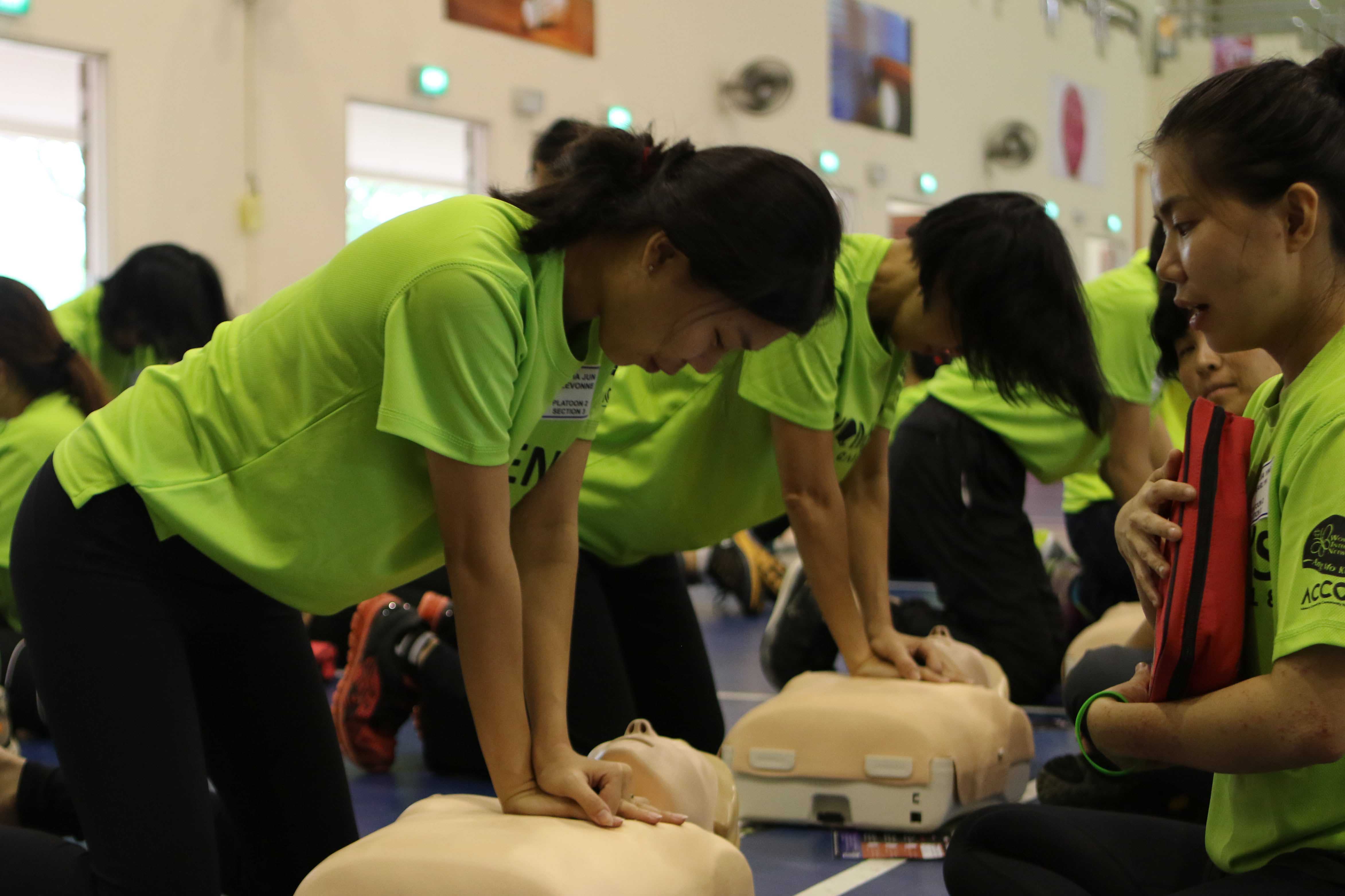 Participants practising their CPR techniques.