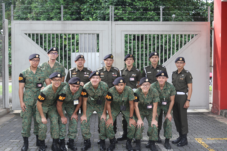 Commander SAF MP Command, COL Lee Kuan Chung with commanders and members of the Military Police Enforcement Unit (MPEU) at Mowbray Camp.