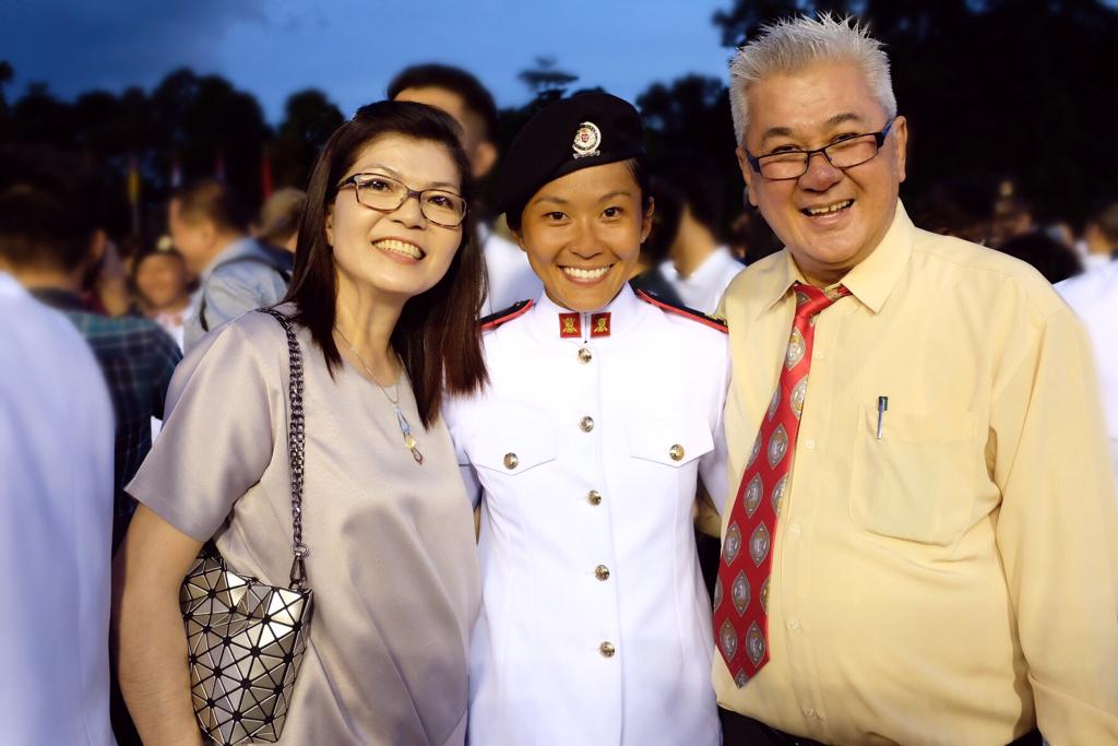 CPT Rachel (middle) with her parents at her Officer Cadet Commissioning Parade.