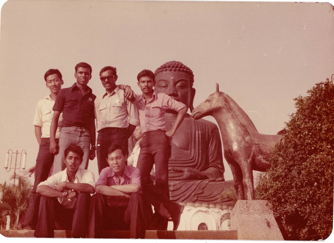 Andrew (seated on the right side) and Suresh (standing 2nd from the left) and their buddies during an outing after their overseas training.