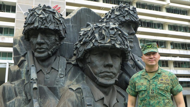 LTC Ng in front of the iconic ‘Men of Respect’ landmark at the Infantry Training Institute.