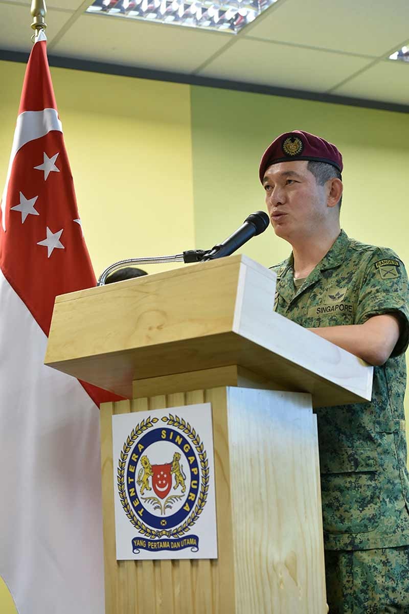 COL Tan delivering his opening address during the enlistment of the inaugural intake of SVs.