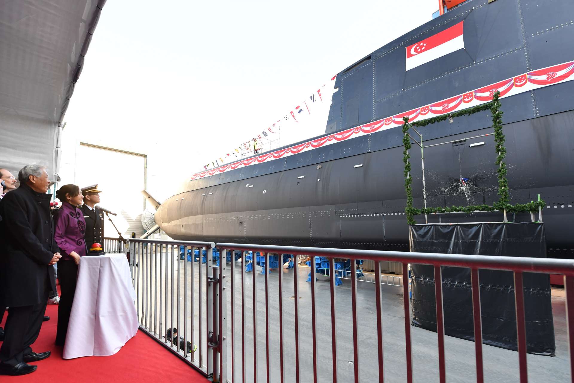 Mrs Ng, wife of Dr Ng, launching the submarine, Invincible, at the thyssenkrupp Marine Systems shipyard in Kiel, Germany.