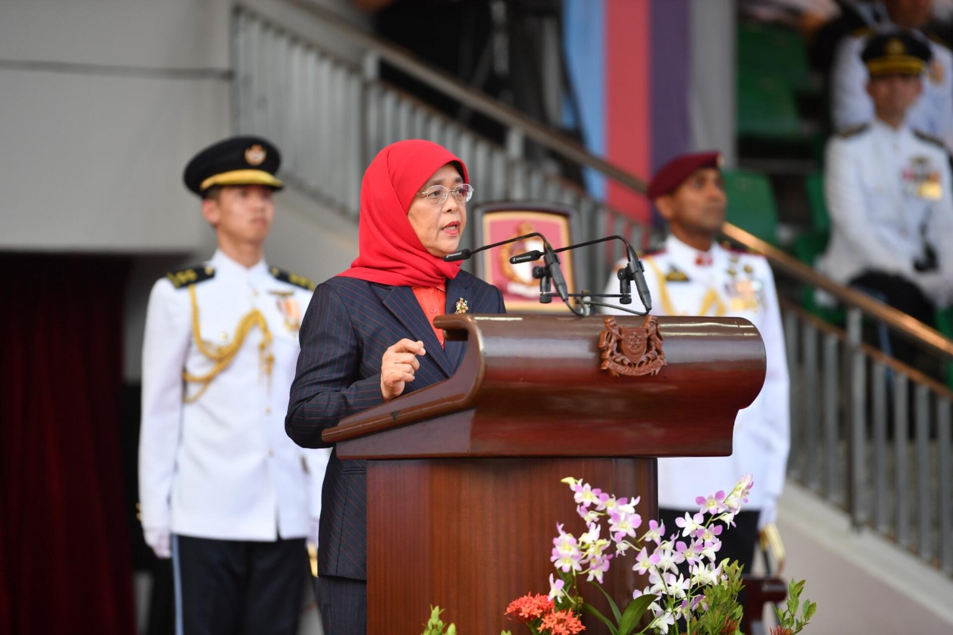 President Halimah Yacob speaking at the DIS Inauguration Parade this evening.