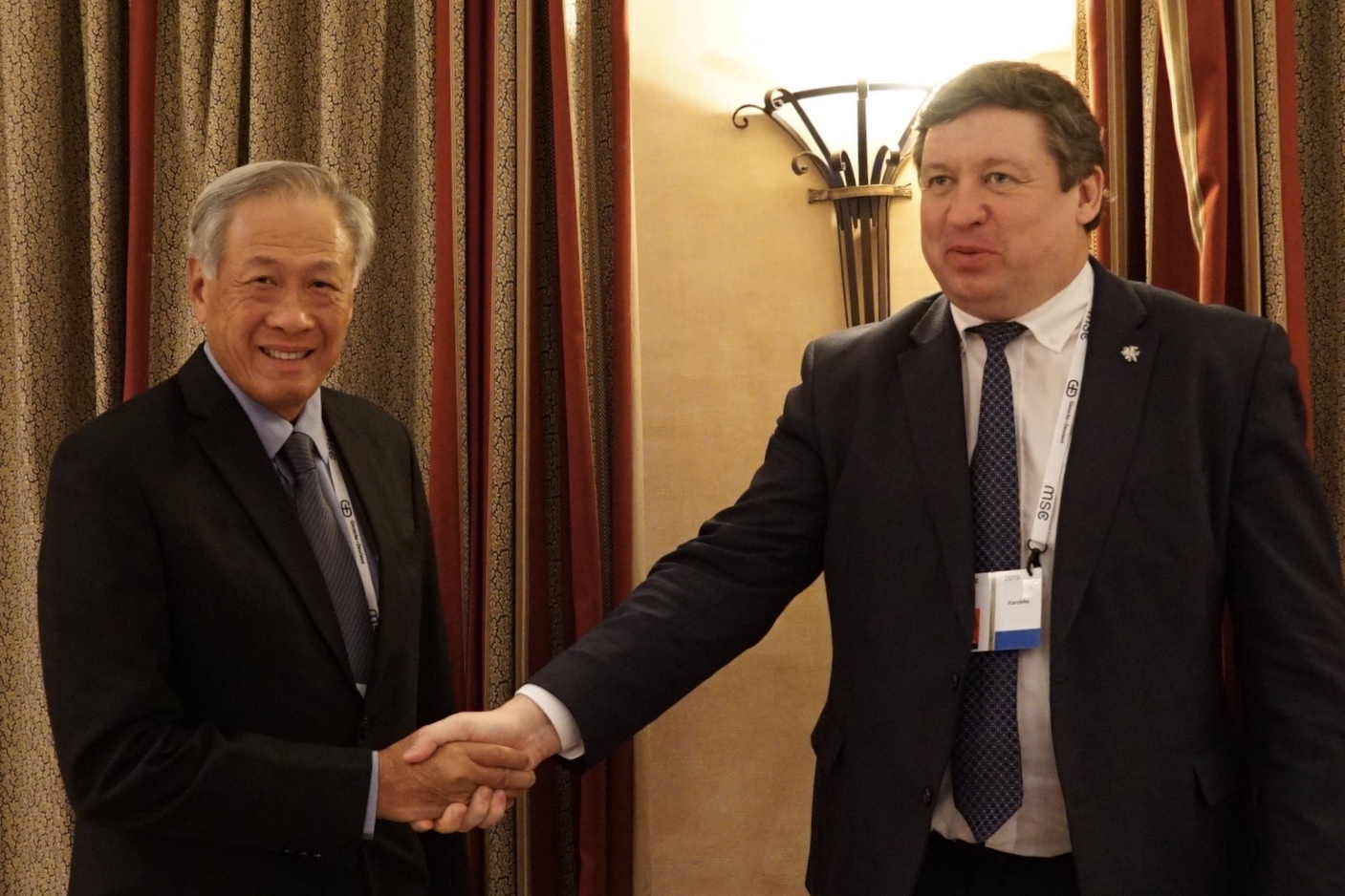 Dr Ng (left) with the Lithuania Minister of National Defence Raimundas Karoblis (right) on the sidelines of the 55th Munich Security Conference.