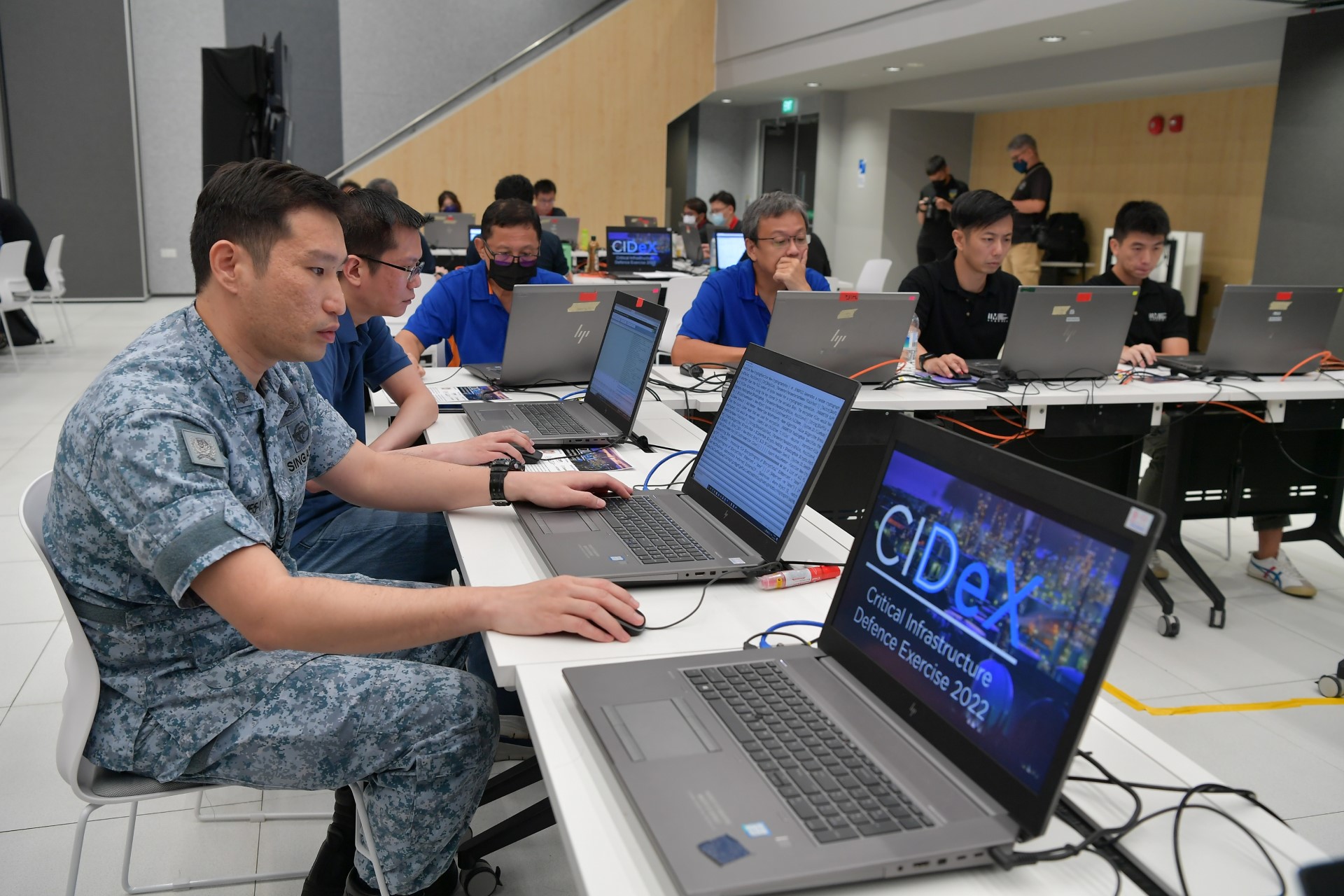 Participants from the Blue Team leveraging cyber tools to defend against simulated cyber attacks during the Critical Infrastructure Defence Exercise CIDeX