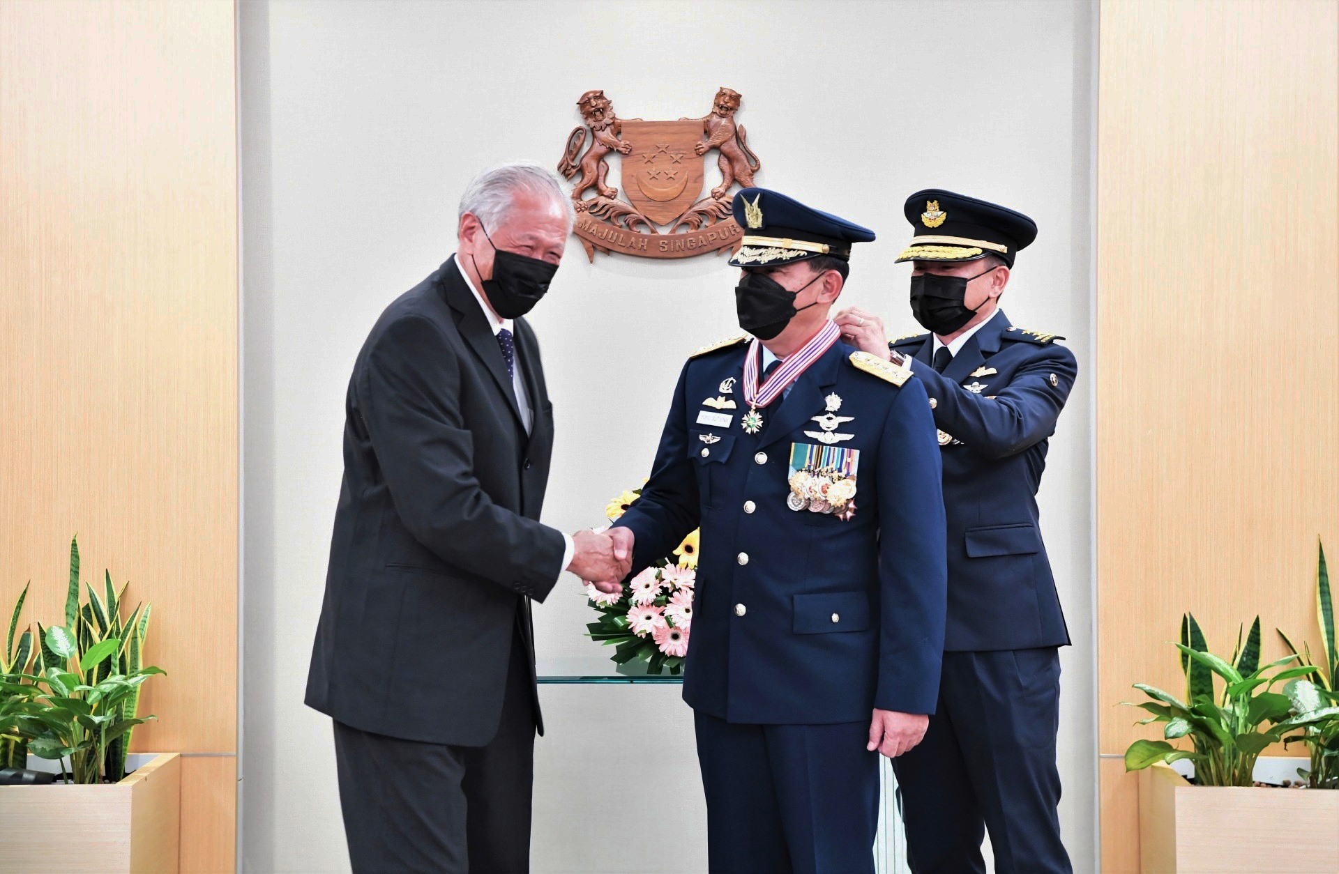 The former Chief of Staff of the Indonesian Air Force (TNI AU), Air Chief Marshal (ACM) (Rtd) Yuyu Sutisna (middle) was presented the Meritorious Service Medal (Military) by Minister for Defence Dr Ng Eng Hen (left) at the Ministry of Defence (MINDEF) earlier today.