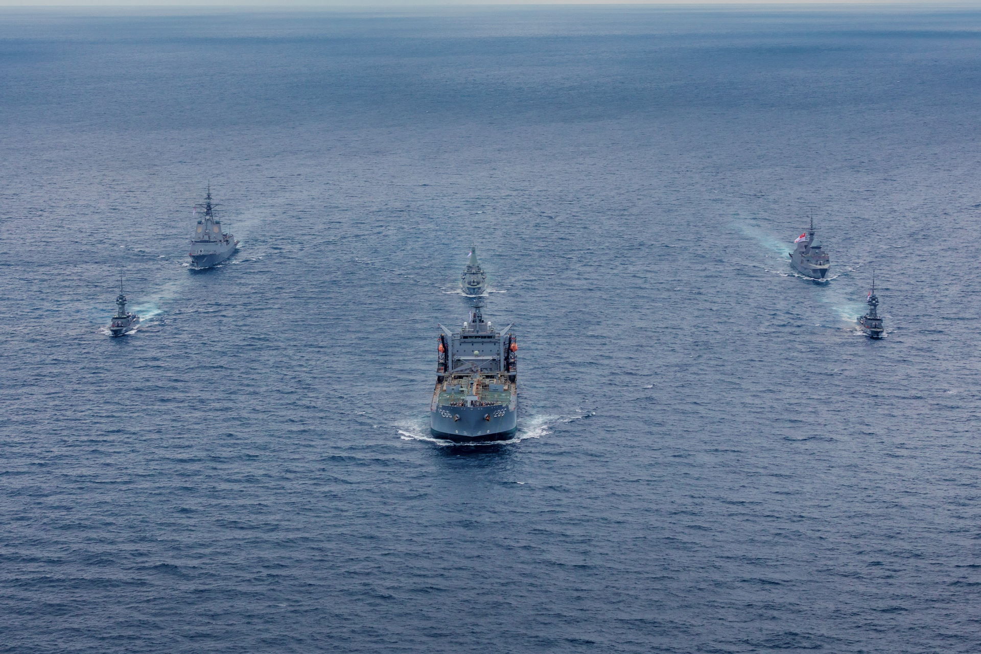 The RSN and RAN ships sailing in formation during the exercise, with the RSN's missile corvettes RSS Valour (left), RSS Valiant (right), frigate RSS Tenacious (right row, back) and littoral mission vessel RSS Dauntless (middle row, back). (Photo Courtesy: RAN).