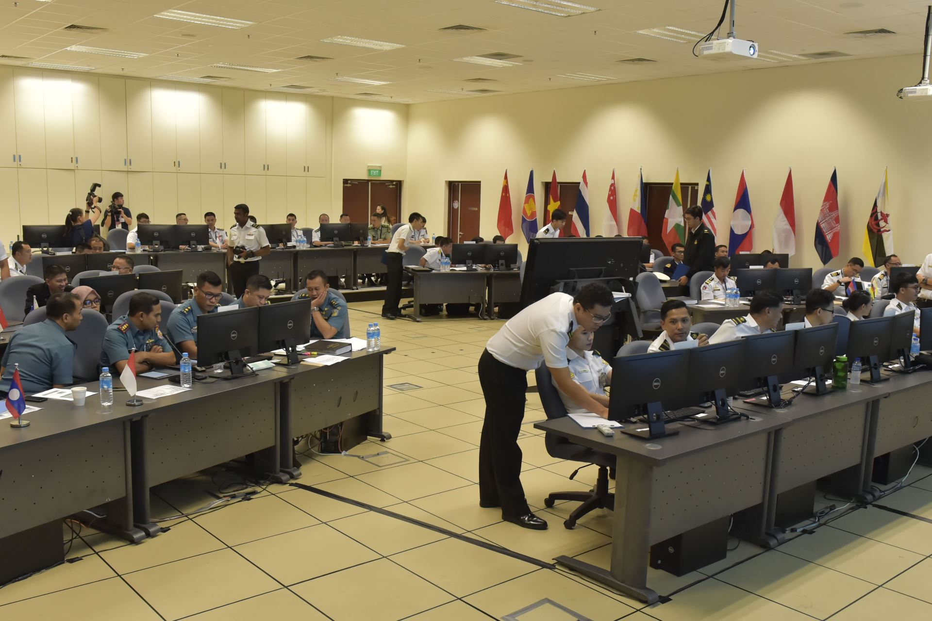 ASEAN and People's Liberation Army (Navy) exercise participants at the MOEC watch floor.