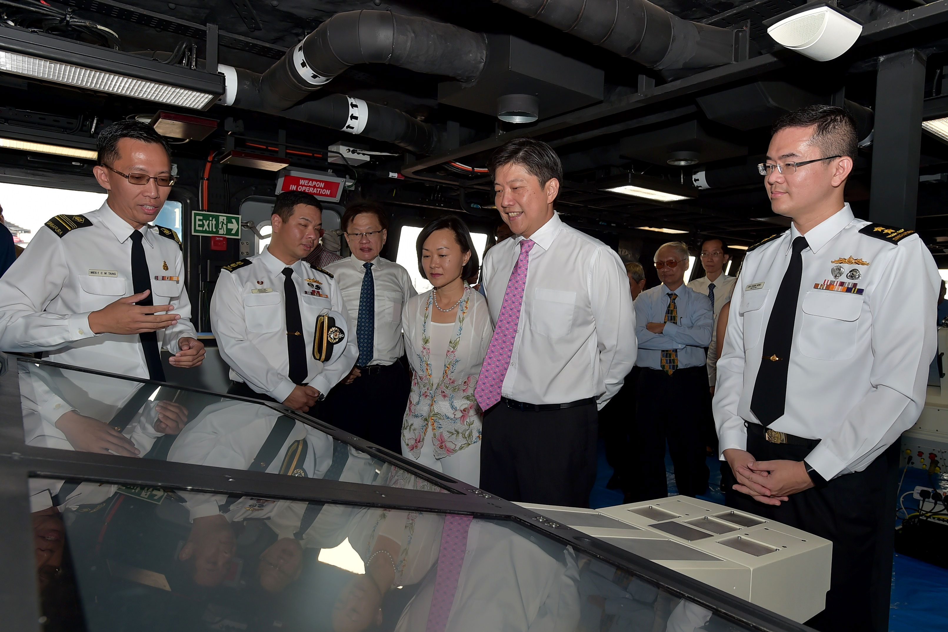 Mr and Mrs Ng (centre) taking a tour of the LMV.