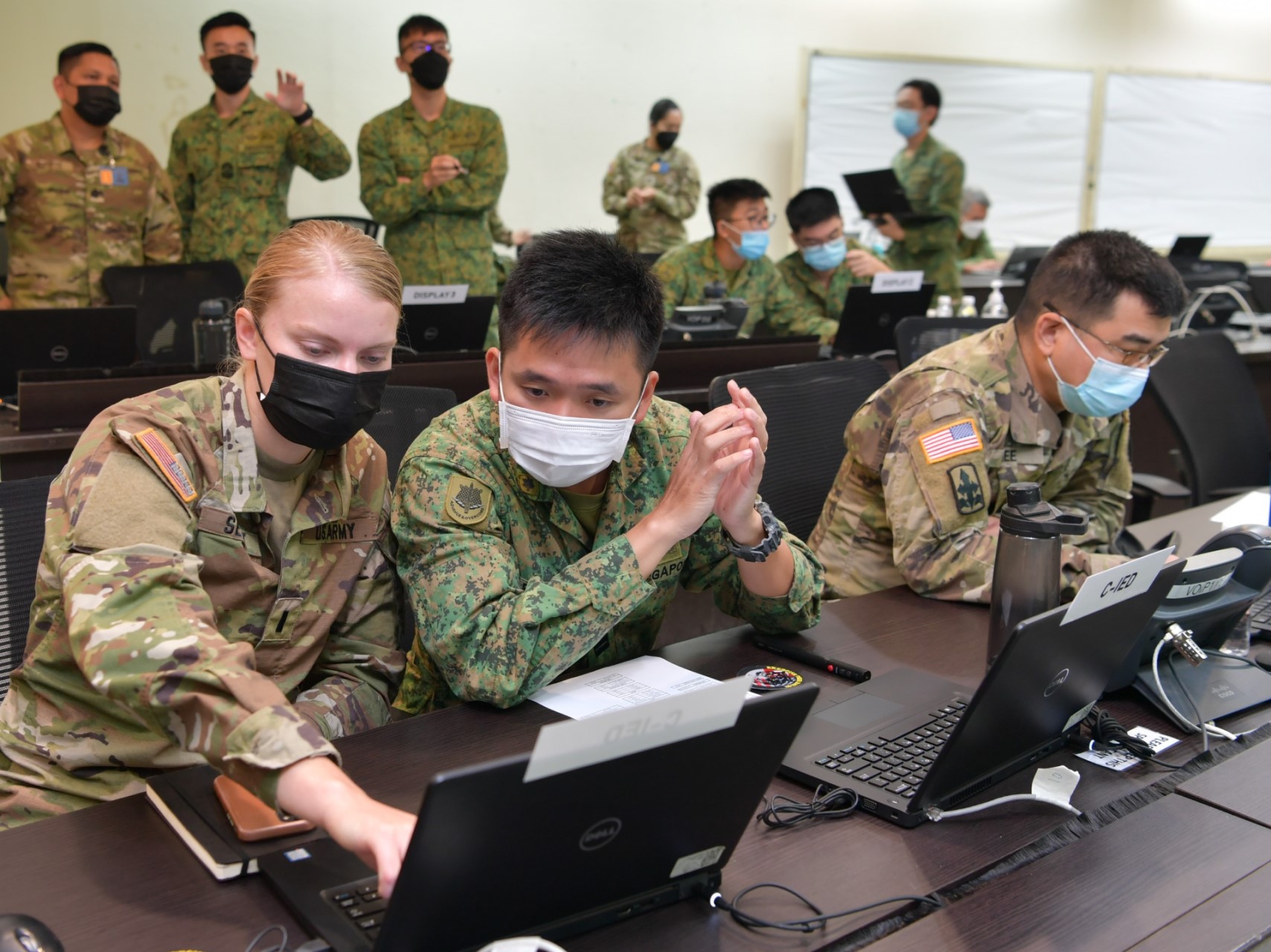 SAF and US Army personnel in discussion during the Command Post Exercise as part of XTiB 22.
