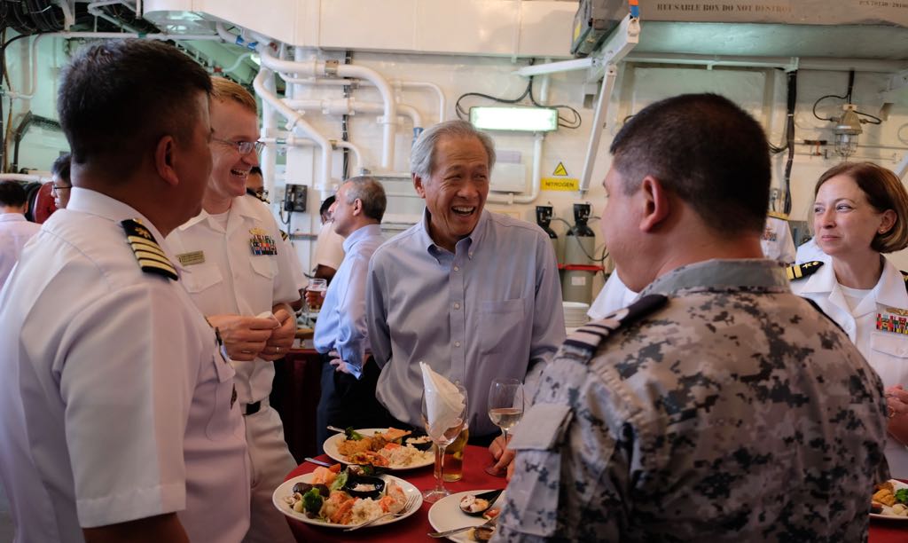 Dr Ng interacting with personnel from the United States (second from left), Philippine (far left) and Thai (far right) navies.