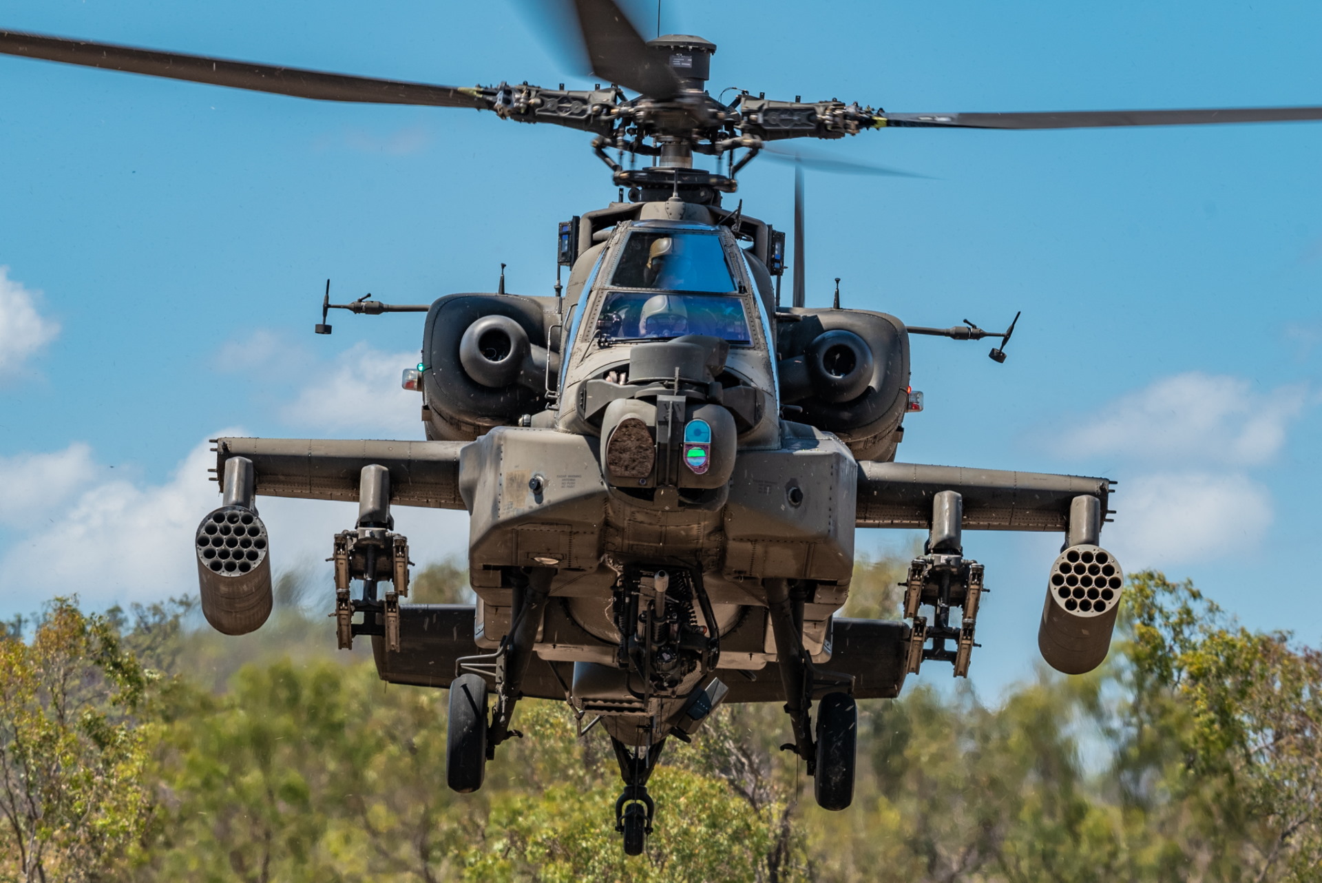 A Republic of Singapore Air Force (RSAF) AH-64D Apache helicopter taking off for live-firing exercises as part of XWB21. 