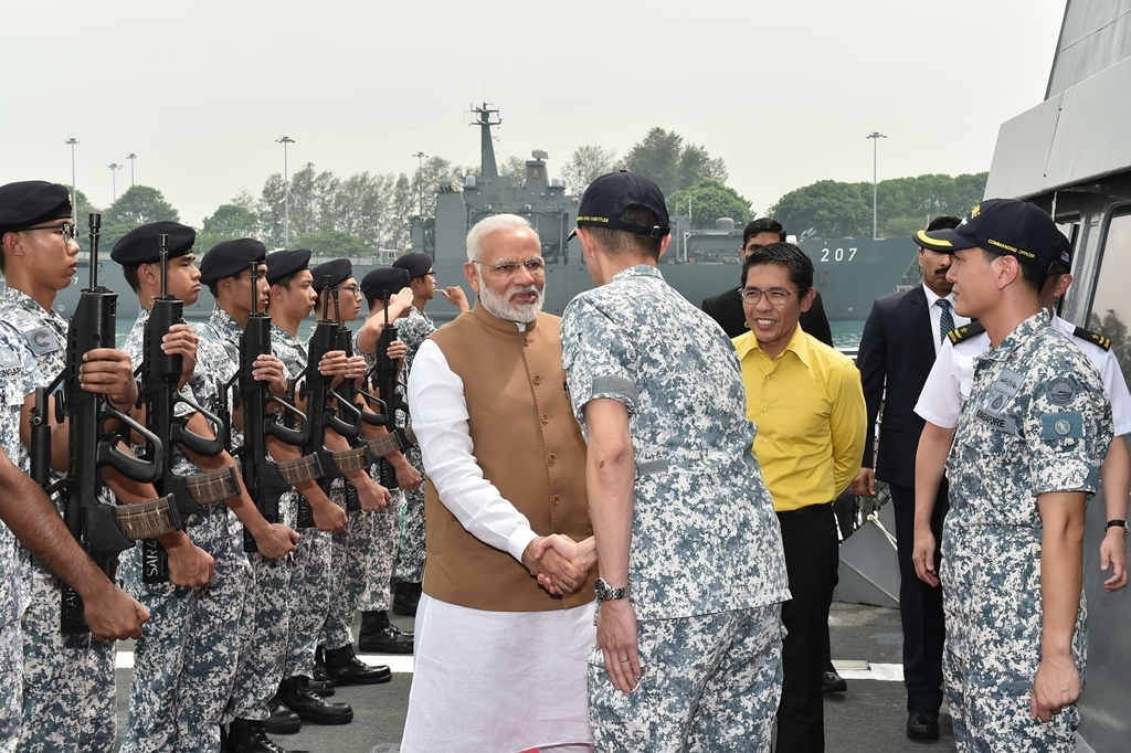 Indian Prime Minister Narendra Modi accompanied by Senior Minister of State for Defence Dr Mohamad Maliki Bin Osman, being welcomed on board the Republic of Singapore Navy (RSN)'s Formidable-class Frigate RSS Formidable.