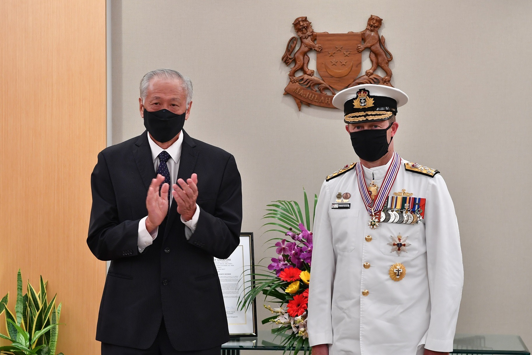 Chief of the Royal Australian Navy Vice Admiral (VADM) Michael Noonan (right) was presented the Meritorious Service Medal (Military) by Minister for Defence Dr Ng Eng Hen (left) at the Ministry of Defence (MINDEF).