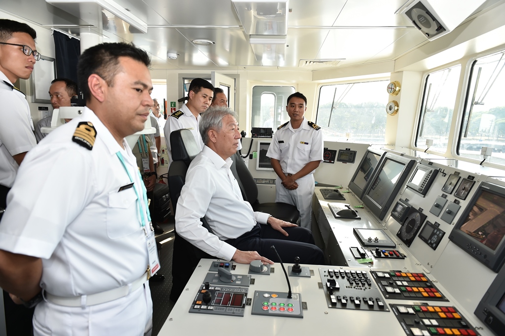 Mr Teo on the bridge of Royal Brunei Navy ship, KDB Daruttaqwa.
