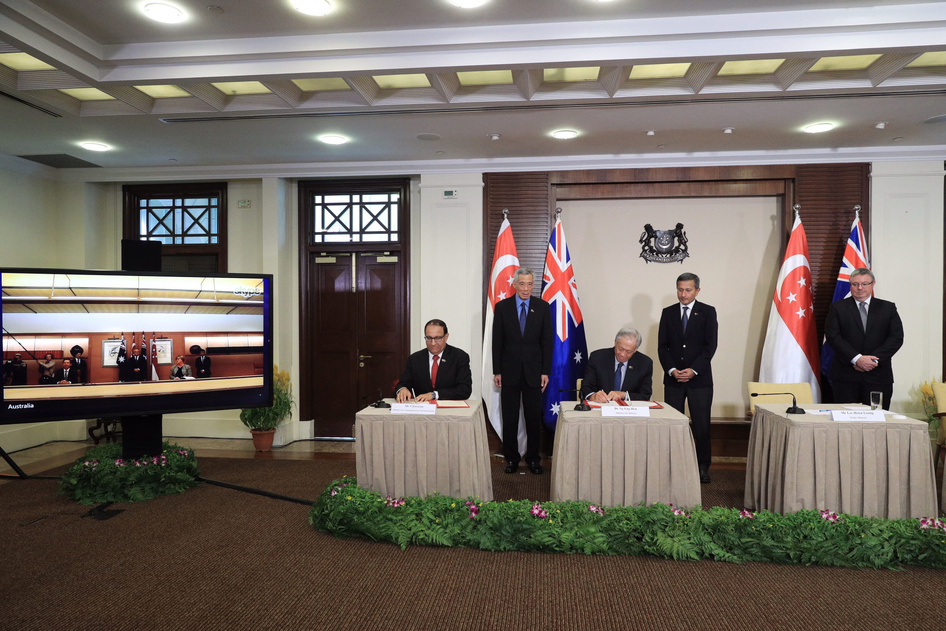 Minister for Defence Dr Ng Eng Hen (third from left) signing the Treaty