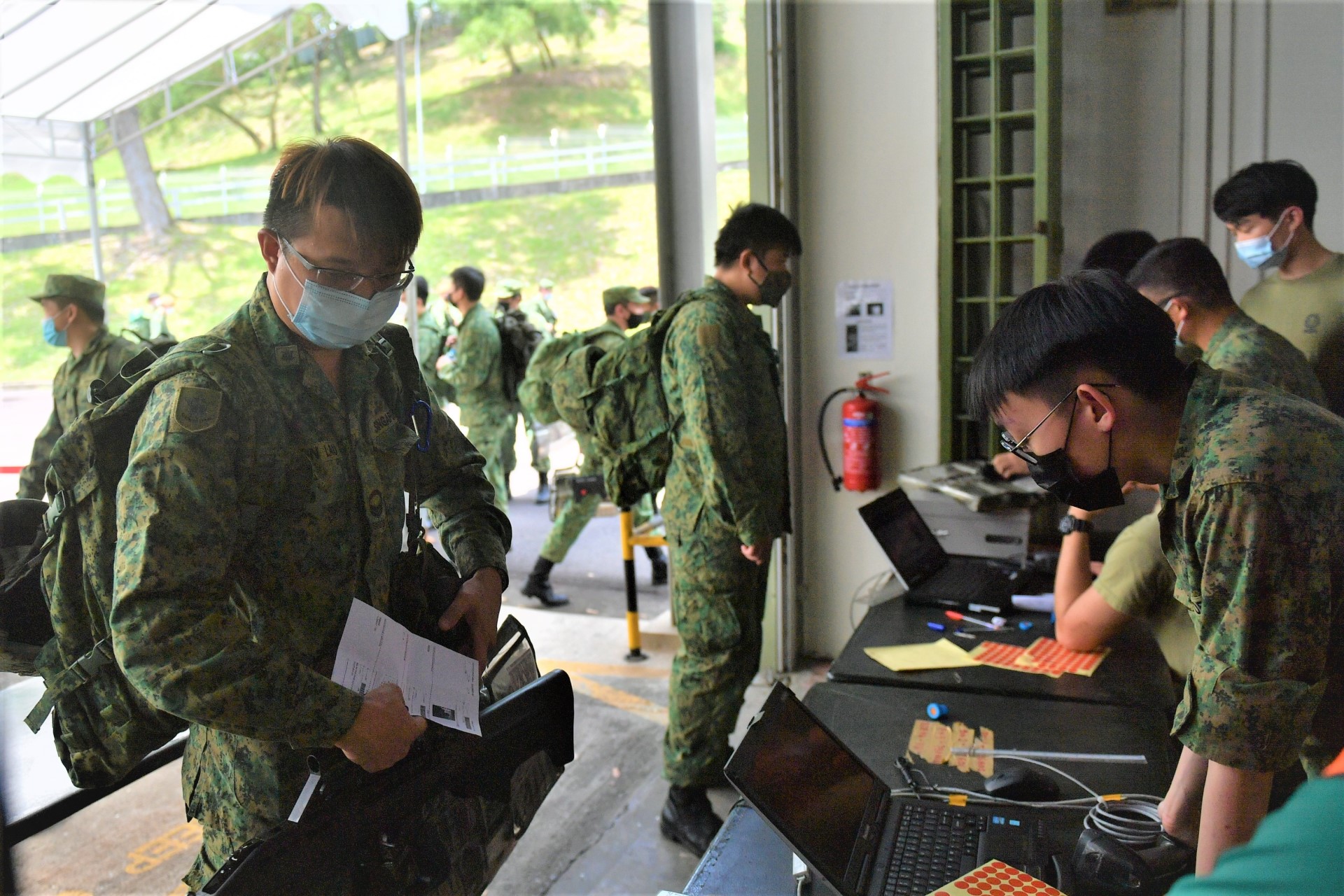 NSmen undergoing in-processing at Maju Camp for the mobilisation exercise.