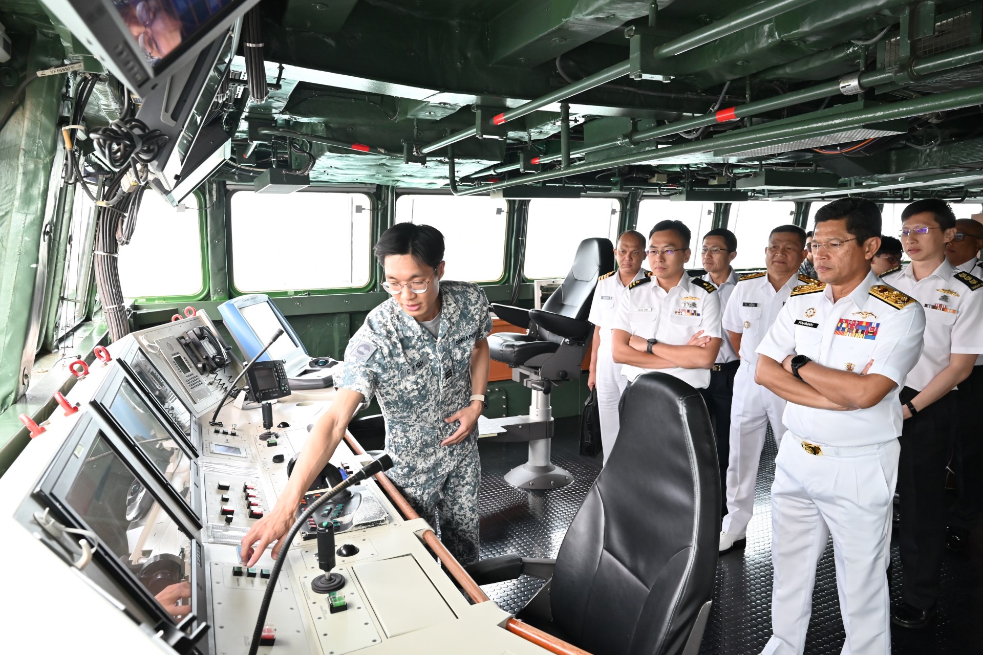 ADM Rahman (right) during his visit to Changi Naval Base yesterday.