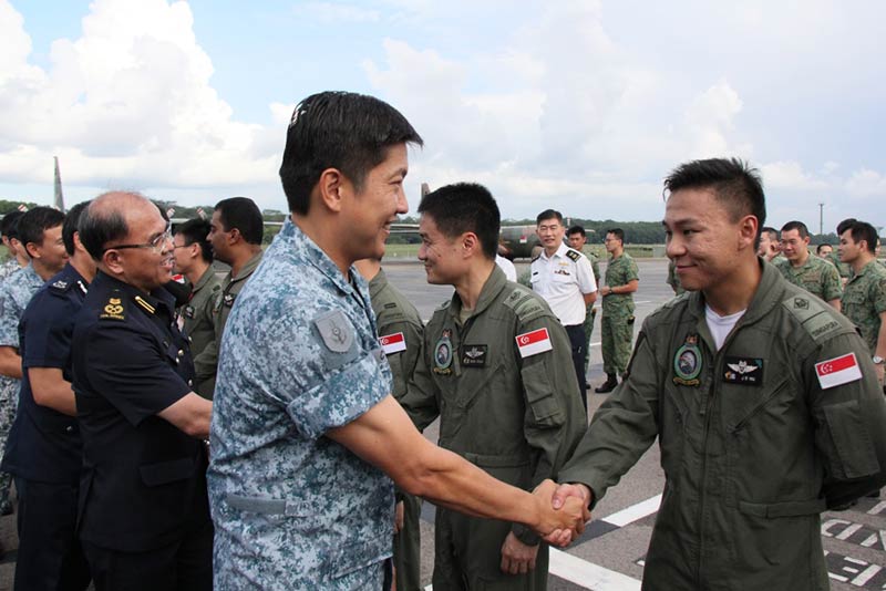 Chief of Defence Force Lieutenant-General Ng Chee Meng sending off personnel at Paya Lebar Air Base this evening. 