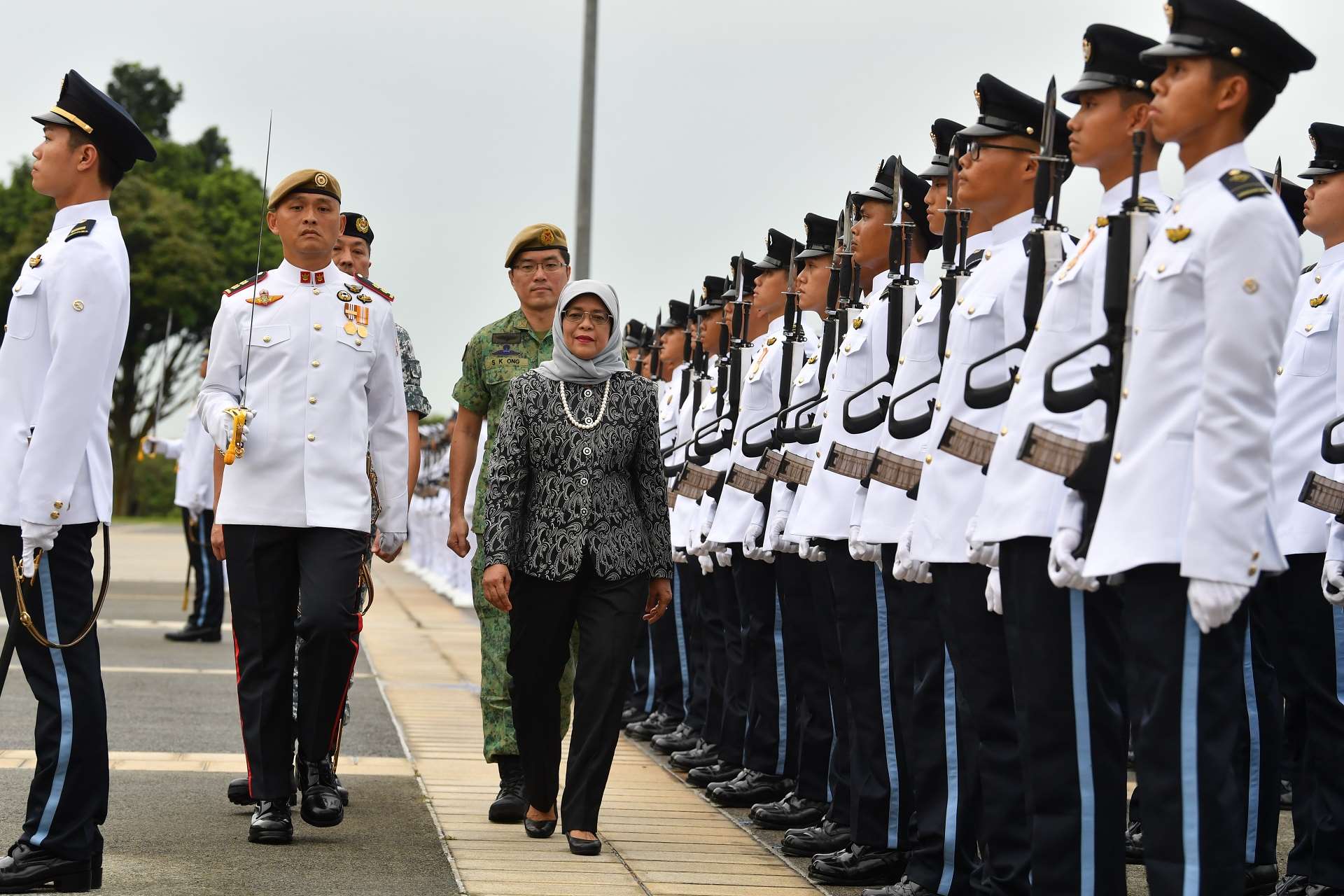 President Halimah Yacob inspecting the Guard of Honour contingents at the Singapore Armed Forces (SAF) Day Parade held at SAFTI Military Institute.