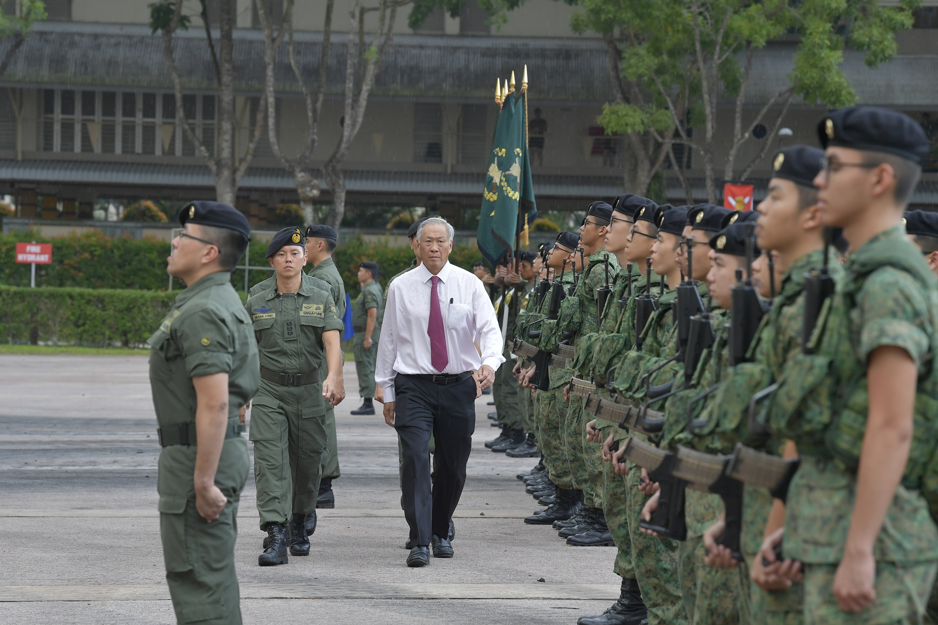 Minister for Defence Dr Ng Eng Hen inspecting the contingents on parade at the Armour Formation's 50th Anniversary.