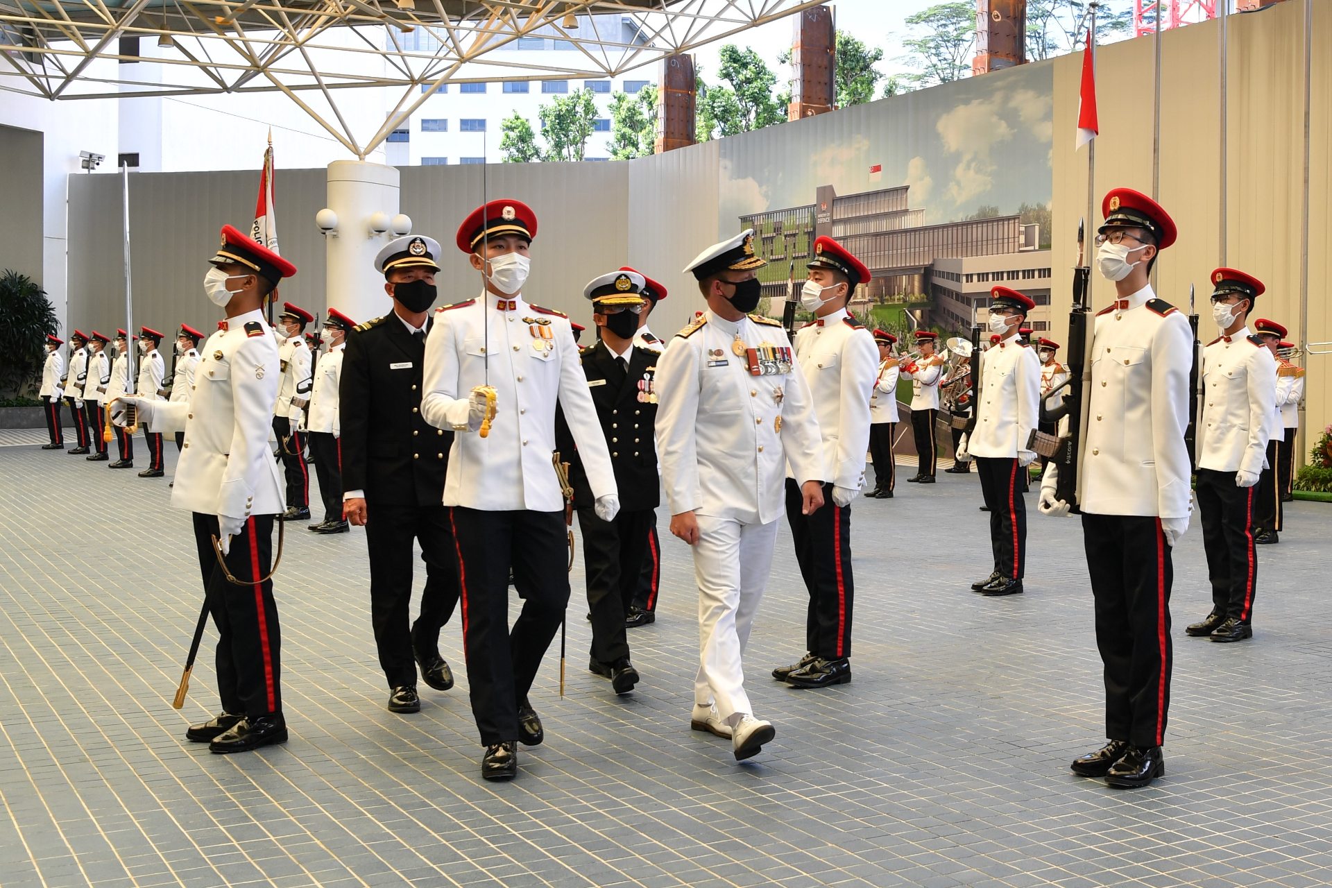 VADM Noonan inspecting the Guard of Honour at MINDEF prior to the award investiture.