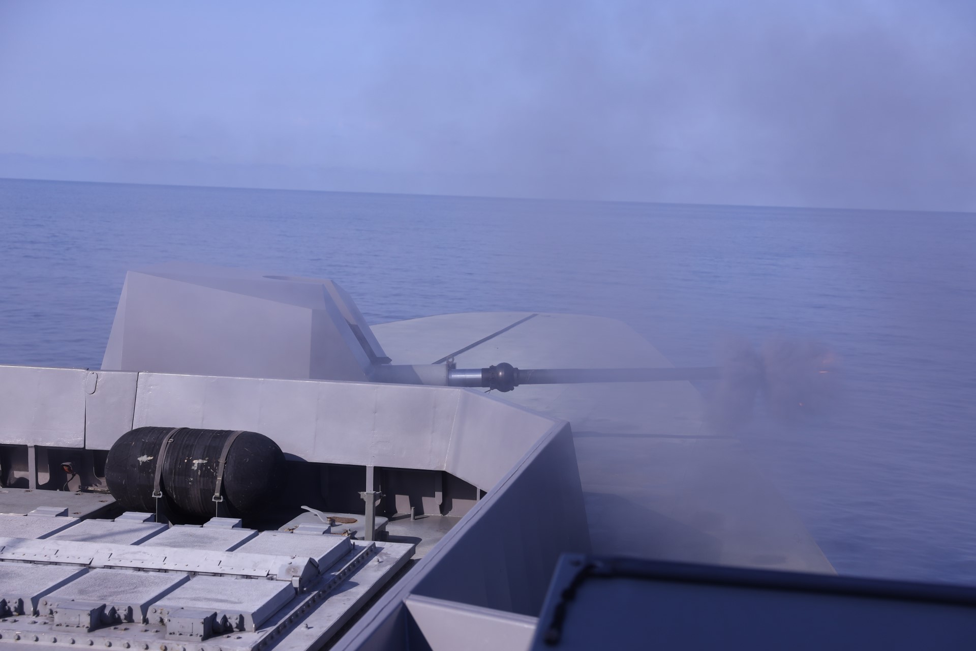 RSS Steadfast conducting a gunnery firing during the exercise.