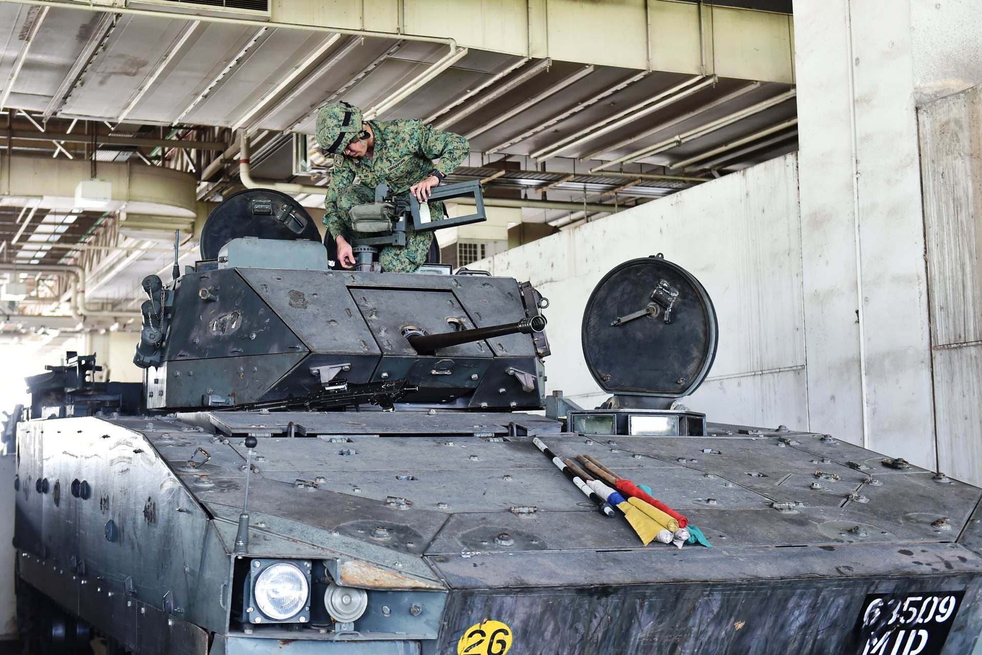 NSmen from 487th Battalion, Singapore Armoured Regiment getting their vehicles ready for operations.