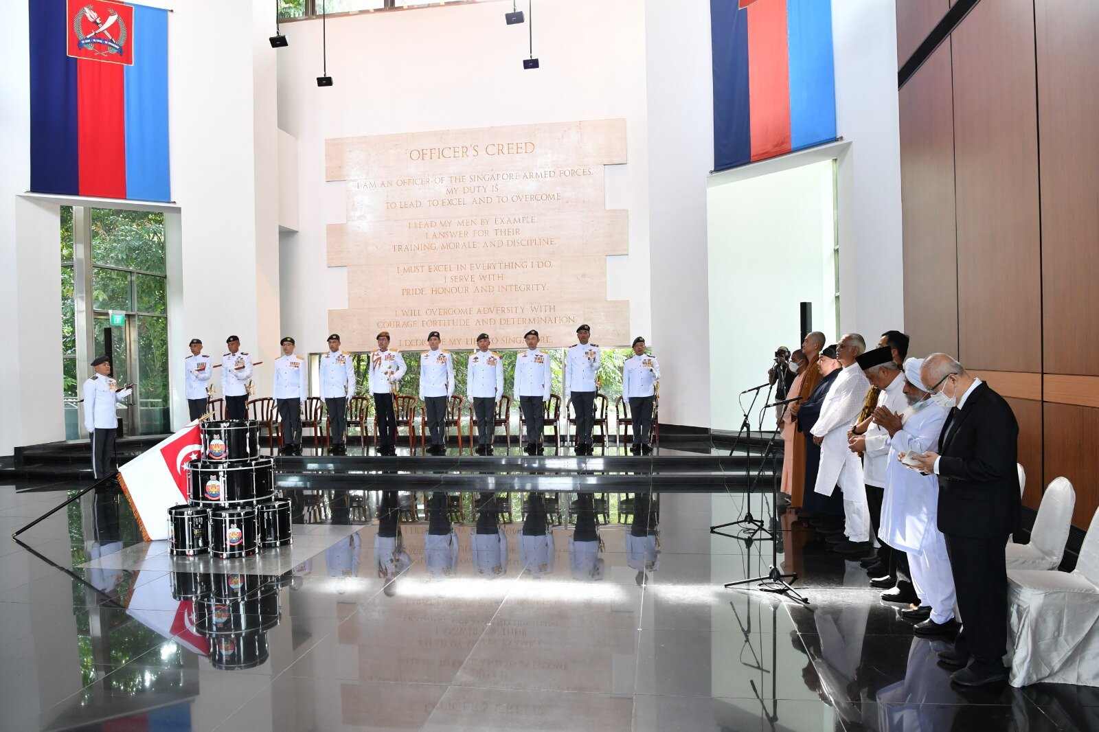 A ceremony was held at the SAFTI Military Institute's Ceremonial Hall prior to the parade for the consecration of the DIS colours.