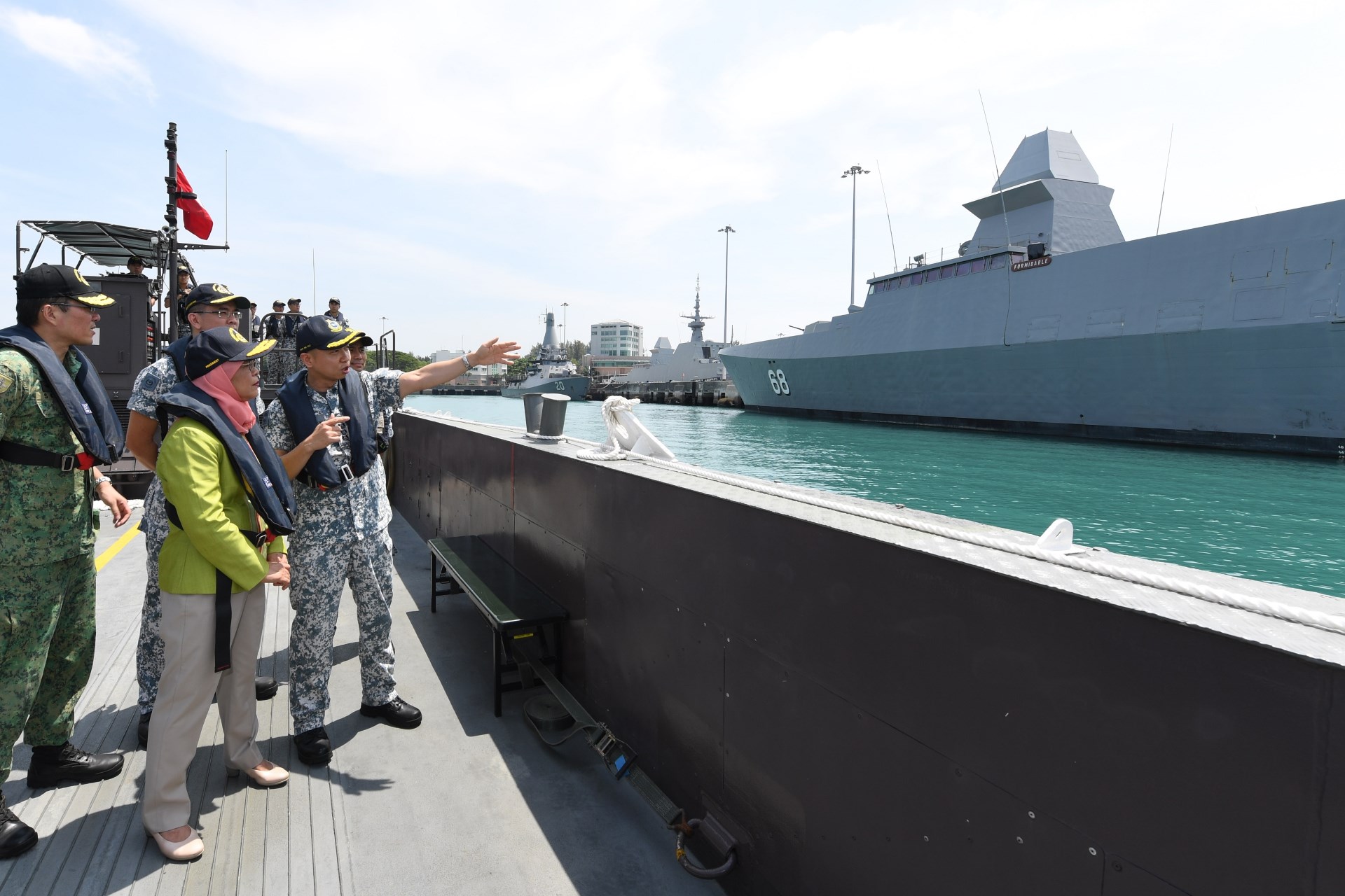 Madam Halimah touring the naval base from the Fast Craft Utility.
