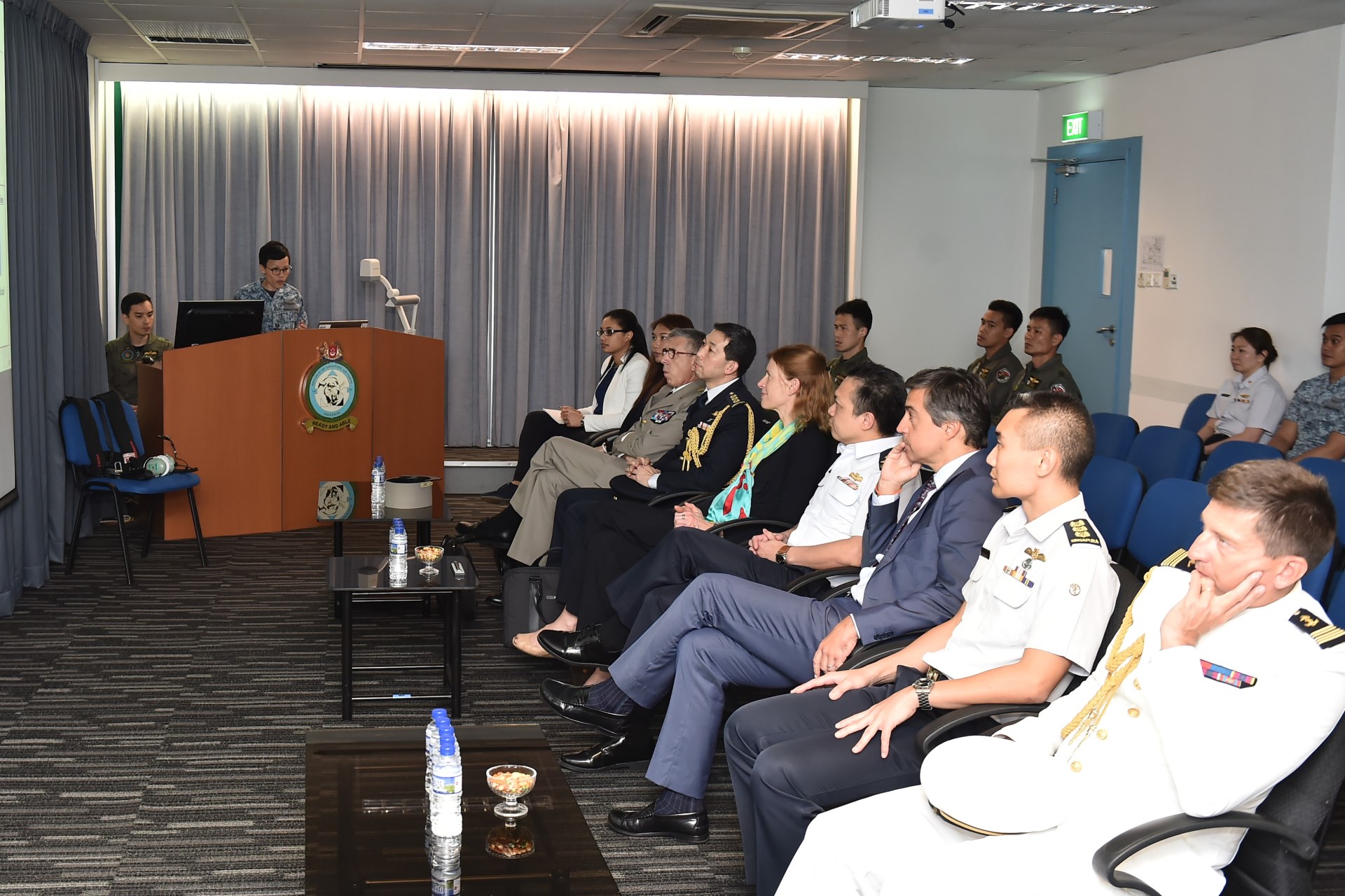 Ms Guitton receiving a brief on the Republic of Singapore Air Force during the visit to Sembawang Air Base.