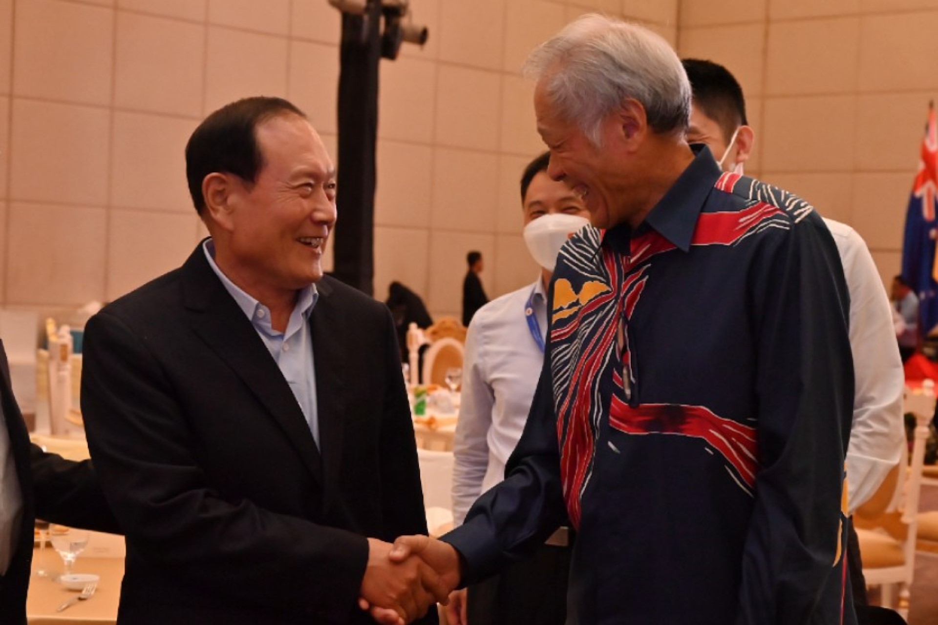 Dr Ng Eng Hen (right) with Chinese State Councilor and Minister of National Defense General Wei Fenghe (left) at the sidelines of the ADMM-Plus.