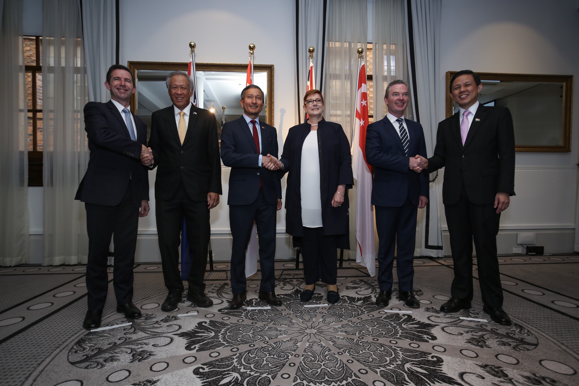 Minister for Defence Dr Ng Eng Hen, Minister for Foreign Affairs Dr Vivian Balakrishnan, and Minister for Trade and Industry Chan Chun Sing being welcomed by their Australian counterparts.