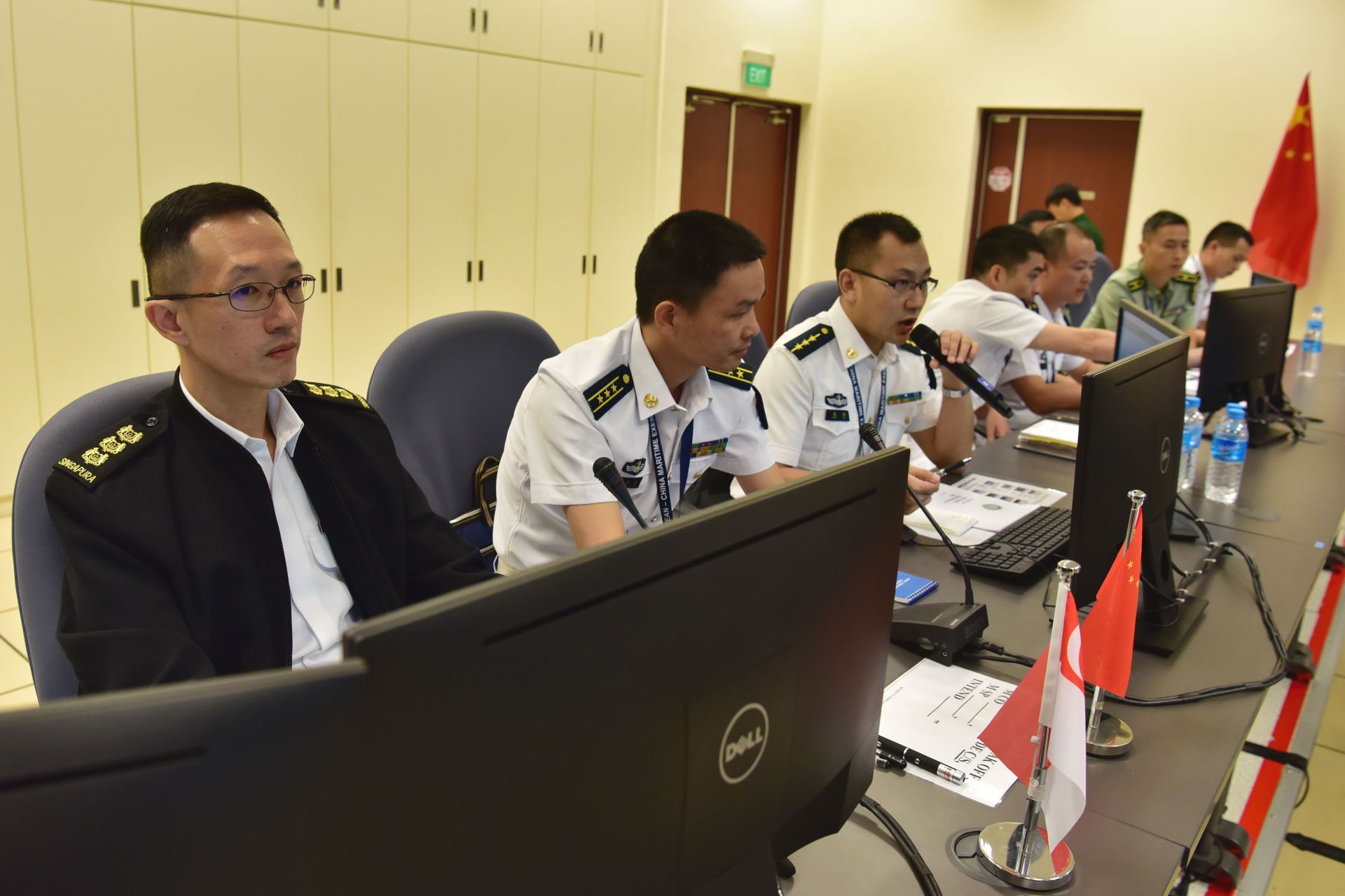 Commander 185 SQN, COL Lim Yu Chuan and Deputy Chief of Operations, Naval Forces of People's Liberation Army Southern Theater Command, CAPT Liang Zhijia co-directing the inaugural ASEAN-China Maritime TTX at the MOEC.
