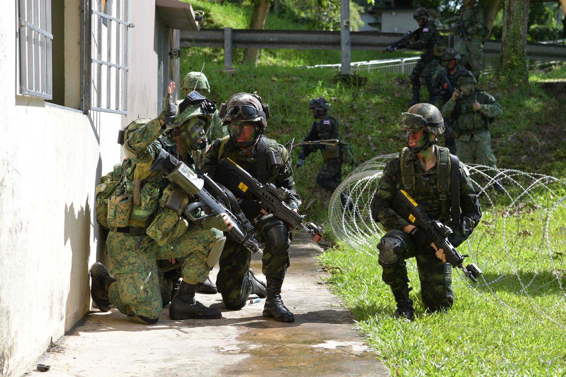 Soldiers from the Singapore Army and the RTA executing a joint urban operations mission during Exercise Kocha Singa.